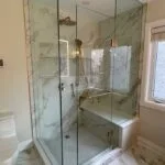 Richmond Hill bathroom renovation with dual vanity and modern lighting by Razco