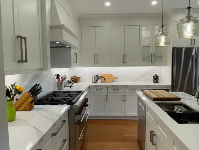 Modern white kitchen renovation in a Richmond Hill condo by Razco Renovation.