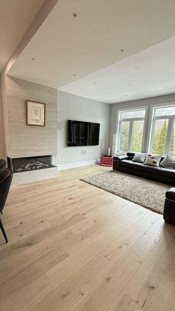 Smart home upgrades: living room home theatre and fireplace wall in Richmond Hill